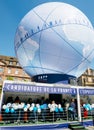 France Candidacy for World Fair 2025 - people admiring globe