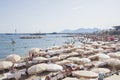 FRANCE, CANNES - AUGUST 6, 2013: People relax on the beach during the high season.