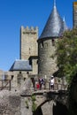 France, CarcassonneÃ¢â¬â AUGUST 28, 2014. Powerful fortifications and bastions of Carcassonne Castle. Beautiful conical blue roofs