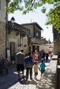 France, CarcassonneÃ¢â¬â AUGUST 28, 2014. View of a crowded street with the shops, cafe, souvenir shops in the castle of Carcassonne