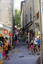 France, CarcassonneÃ¢â¬â AUGUST 28, 2014. View of a crowded street with the shops, cafe, souvenir shops in the castle of Carcassonne