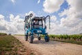 France Chablis 2019-06-21 Blue tractor among vineyard rows