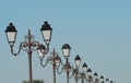 France- Close Up of a Long Row of Ornate Antique Street Lights Royalty Free Stock Photo