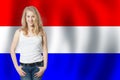 France concept with happy woman on French flag background. Travel in France and study french language.