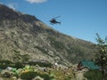 France, Corsica, Corsician Alps, June 19, 2017: helicopter dropping off supplies for mountain camp Refuge de Pietra Piana on