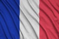 France flag is depicted on a sports cloth fabric with many folds. Sport team banner Royalty Free Stock Photo