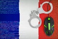 France flag and handcuffed computer mouse. Combating computer crime, hackers and piracy