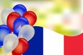 .France flag, national colors balloons and blurred background.