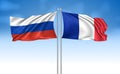 France Flag with Russia Flag with cloudy sky Royalty Free Stock Photo