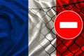 France flag on satin, fence with barbed wire, symbolic red sign no entry, entry prohibited, travel restrictions across European Royalty Free Stock Photo