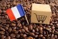 France flag with shopping cart on coffee bean, import export trade online commerce Royalty Free Stock Photo