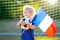 France football fan kids. Children play soccer Royalty Free Stock Photo