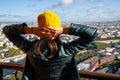 France, girl enjoying Paris sunny cityscape from Eiffel tower