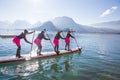 19.01.2019 - France Lake Annecy GlaGla Race 2019. SUP paddlers girl team is participating in race in France Alps lake