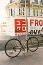 France, Lyon June 16, 2017: The bicycle is parked to a post on one of the streets of the old city of Lyon