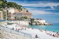 France, Nice, 15 May 2017: Promenade Anglais, Beautiful Public Beach, Tourists, Sunbath People, Swim, Sunny Day, People