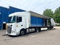 France - 06.23.2023: An open semi-trailer curtain krone on both sides for loading goods into a daf xf truck