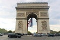 France, Paris - May 2023 - The Arc de Triomphe de l'Etoile with French flag