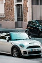 France, Paris - May 18, 2023: White Mini Cooper S Cabrio in the city