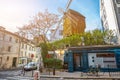 France. Paris. Moulin de la Galette. Streets of Montmartre in sunny autumn evening in backlit sunset sunbeam with vintage camera