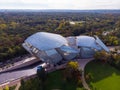 FRANCE, PARIS - OCT 2019: Aerial shot of Louis Vuitton Foundation museum modern building in Paris, France. Eiffel Tower Royalty Free Stock Photo