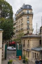 France, Paris, October 6, 2014: Paris residential buildings. Old Paris architecture, beautiful facade, typical french houses on