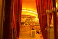 Very cute, colorful and pink cafe facade in Paris Street during night.