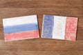 France and Russia flag, concept cooperation friendship on wood background. Royalty Free Stock Photo