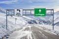 France ski town Belle Plagne and La Plagne road big sign with a lot of snow and mountain sky