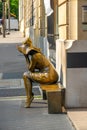 Street Sculpture of a Girl in Sunny Summer Paris