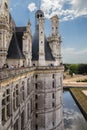 France. Tourists visiting the Royal Castle of Chambord from the terrace. The castle is included in the UNESCO World Heritage Site.