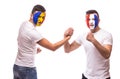 France vs Romania. Football fans of national teams friendly handshake before match Royalty Free Stock Photo