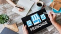 Franchise business model and growth concept on device screen. Royalty Free Stock Photo