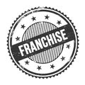 FRANCHISE text written on black grungy round stamp