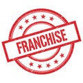 FRANCHISE text written on red vintage round stamp