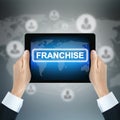 FRANCHISE word on tablet pc screen Royalty Free Stock Photo