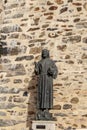 Francis of Assisi bronze statue at Guadalupe Monastery entry Caceres, Extremadura, Spain Royalty Free Stock Photo