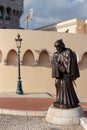 Francois Grimaldi statue disguised as a monk with frock in fron