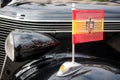 Francoist flag on vintage car Royalty Free Stock Photo