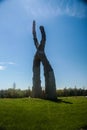 FRANCONIA SCULPTURE PARK, SHAFER, MINNESOTA Letter x isolated. Blue sky and green field. abstract art