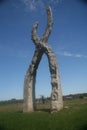 FRANCONIA SCULPTURE PARK, SHAFER, MINNESOTA Letter x isolated. Blue sky and green field. abstract art