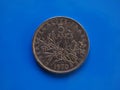 5 francs coin, France over blue Royalty Free Stock Photo