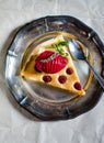 Frangipane cake on metallic plate Royalty Free Stock Photo