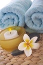 Frangipani,candle and towel on mat Royalty Free Stock Photo