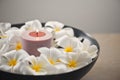 Frangipani flower and candle decoration