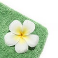 Frangipani flower on towel isolated on white Royalty Free Stock Photo