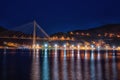 Franjo Tudjman bridge and harbor of Dubrovnik, beautiful night cityscape with city lights and dark blue sky, Croatia Royalty Free Stock Photo