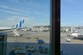 Frankfurt Airport Germany August 02, 2022 - Airplanes and  luggage trolleys at the terminal Royalty Free Stock Photo