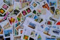 Frankfurt - August 2021: large set of mixed parts of envelopes and postage stamps from different countries, many objects, Royalty Free Stock Photo