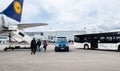 Police customs van near Lufthansa aircraft in airport